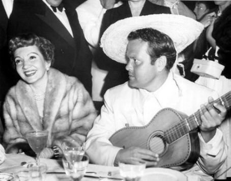 Orson Welles and Claudette Colbert