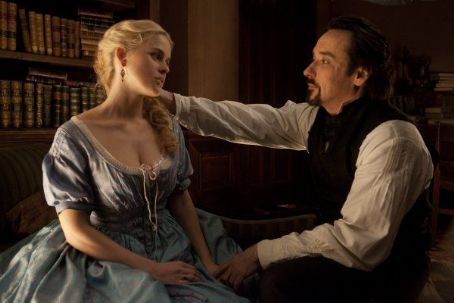 John Cusack and Alice Eve