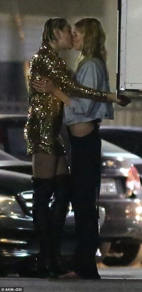 PICTURED: Miley Cyrus passionately kisses Victoria's Secret Angel Stella Maxwell after coming out as bisexual