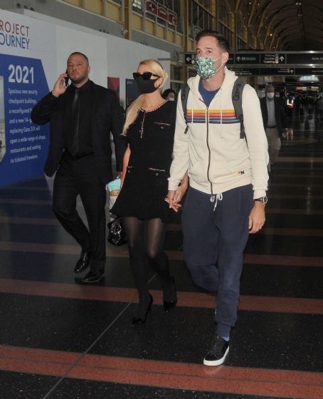 Paris Hilton – With her fiance Carter Milliken Reum Depart Washington DC