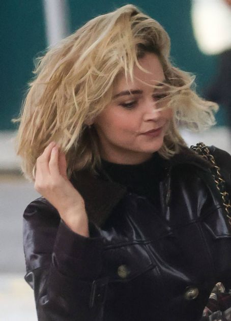 Jenna Coleman – In a chocolate leather coat seen with Aidan Turner in