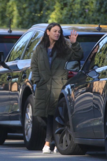 Mila Kunis – Out in olive green puffer jacket in Beverly Hills
