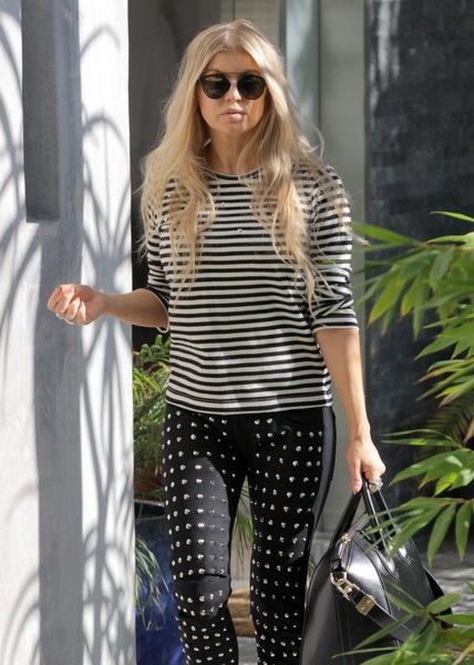 Fergie is spotted leaving her home and catching a limo ride in Brentwood, California on October 6, 2015