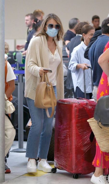 Elizabeth Hurley – Arrives At Nice Airport - FamousFix