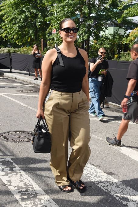 Ashley Graham – Leaving Michael Kors SS24 show at Domino Park in