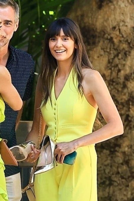 Nina Dobrev – Wearing yellow dress at Ben Bruno’s rehearsal dinner in West Hollywood