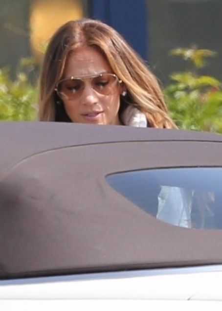 Jennifer Lopez – Heads to a studio in Los Angeles dressed in white head