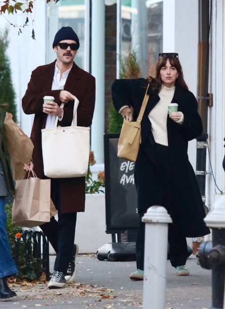 Dakota Johnson – On a coffe run with a friend in West Village