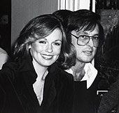 Robert Evans and Phyllis George