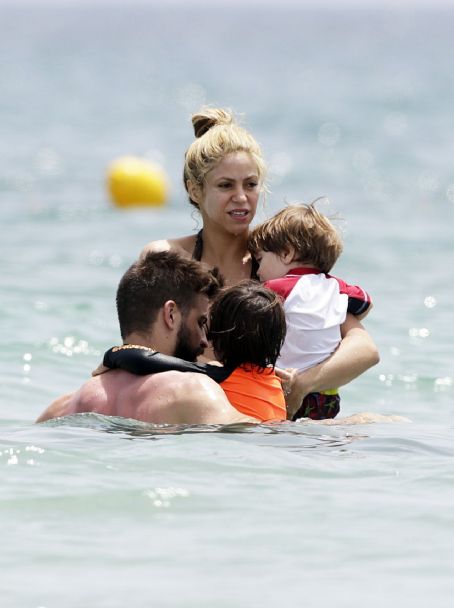 Shakira and her family on a beach in Ibiza, Spain