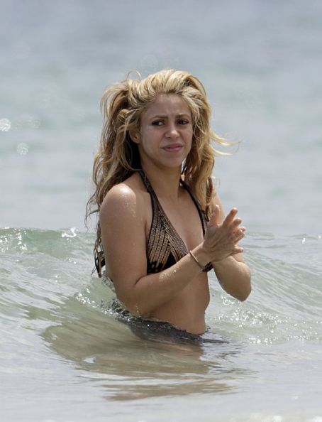 Shakira and her family on a beach in Ibiza, Spain