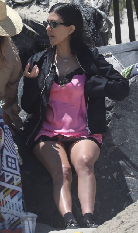 Kim Kardashian – With Kourtney  seen at the beach in Malibu for a birthday party