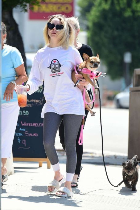 Alessandra Torresani with her dog in Studio - FamousFix