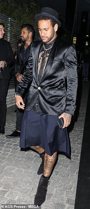 Neymar smoulders in a sleek black blazer, matching shorts and a gold-embellished shirt as he launches new Diesel fragrance