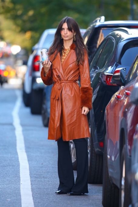 Emily Ratajkowski – In a long brown leather overcoat in New York