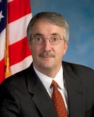 Dwight E. Adams