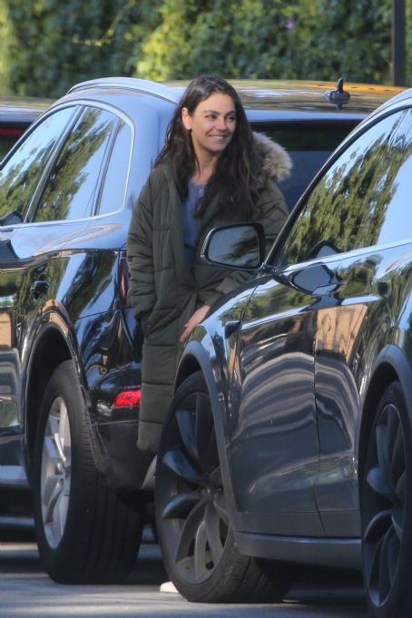 Mila Kunis – Out in olive green puffer jacket in Beverly Hills