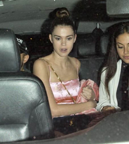 Maia Mitchell – In a short PVC Material dress leaving Catch in West Hollywood