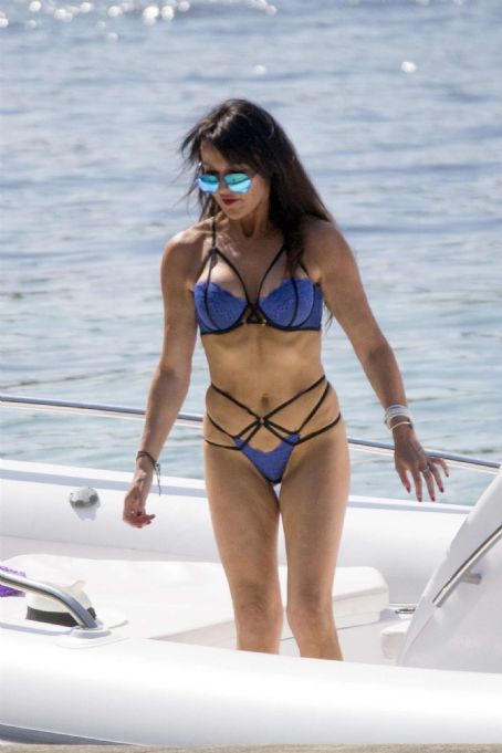 Lizzie Cundy Wearing Bikini and Swimsuit on the beach in