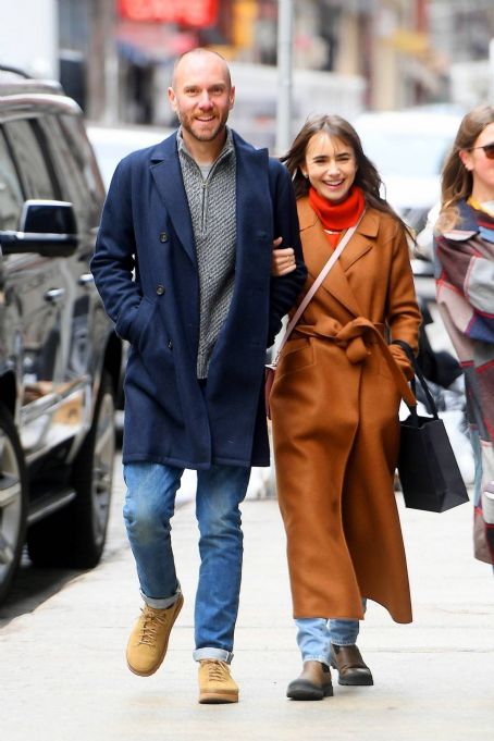 Lily Collins – With her husband Charlie McDowell take a stroll in SoHo