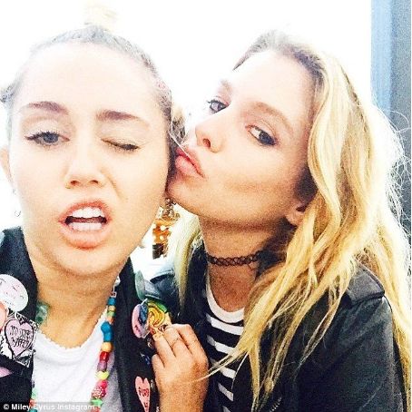 Miley Cyrus steps out solo for the first time since it was reported that she has 'been dating Victoria's Secret model Stella Maxwell for months'
