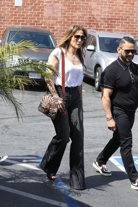 Jennifer Lopez – In black denim flare pants out for brunch in Los
