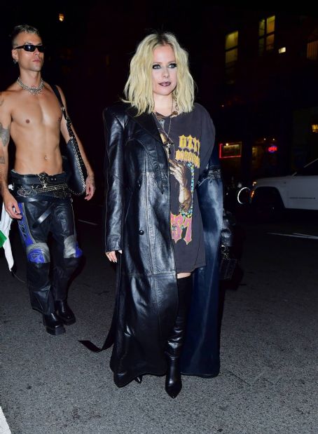 Avril Lavigne – With designer Luis De Javiersteps seen out at the party in New York
