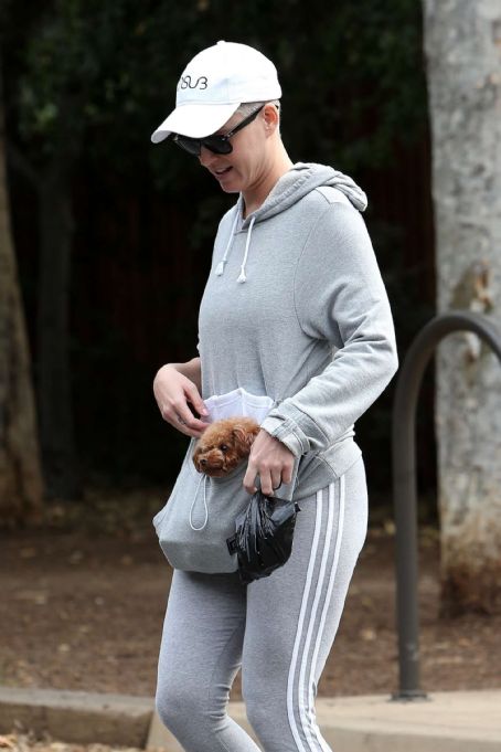 katy perry wears grey adidas hoodie and leggings as she leaves her office  with her pup in west hollywood, california-030320_2