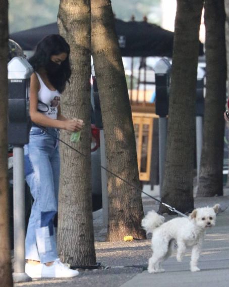 Camila Mendes – Out to Walk Her dog Truffle in Vancouver - FamousFix