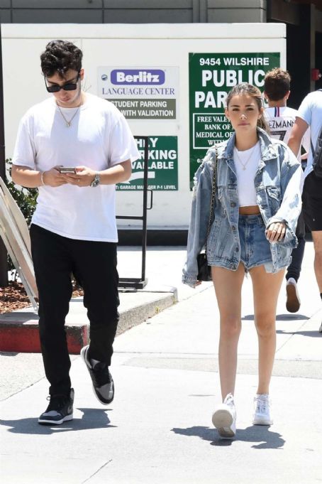 Madison Beer in Daisy Dukes with Zack Bia at South Beverly Grill in Beverly Hills