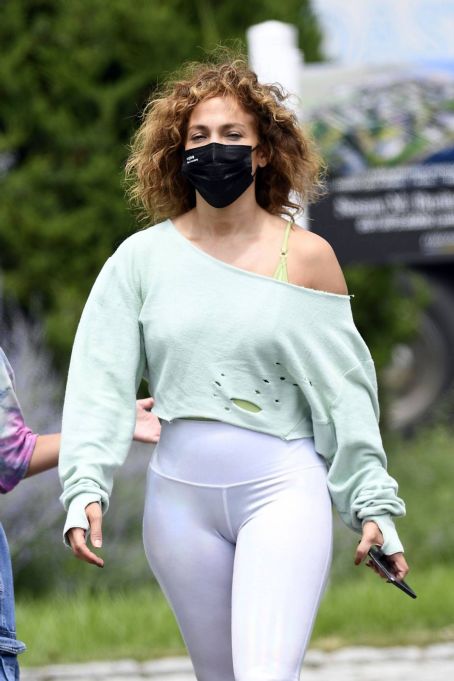 Jennifer Lopez – In white leggings out in Water Mill in New York