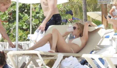 Heather Graham – Hits the beach in a white bikini in Tulum