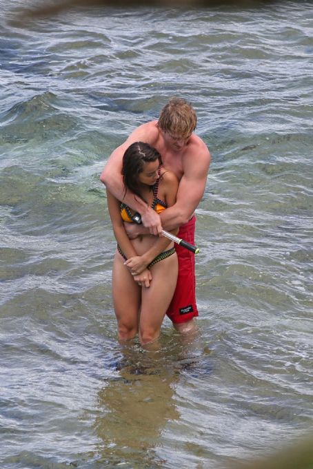 Chloe Bennet in Bikini with boyfriend at the beach in Hawaii