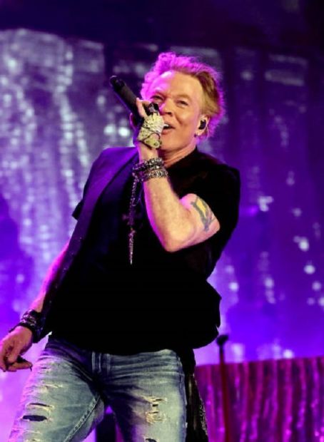 INDIO, CALIFORNIA - APRIL 30: Axl Rose of Guns N' Roses performs onstage with Carrie Underwood during Day 2 of the 2022 Stagecoach Festival at the Empire Polo Field