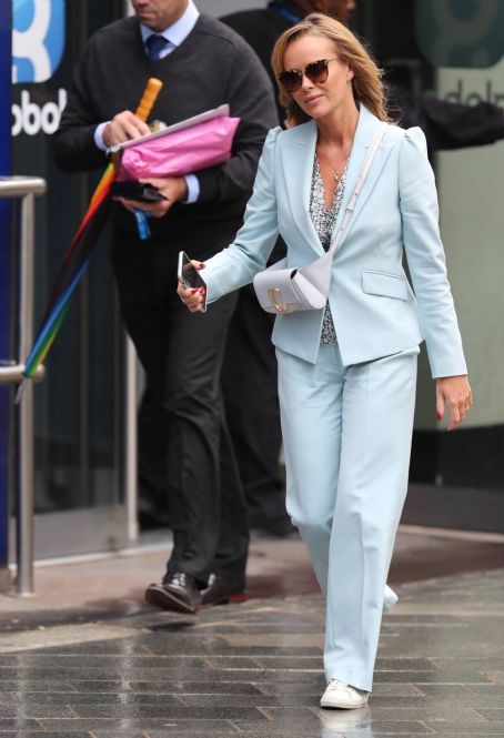 Amanda Holden – Wearing a light blue pantsuit after her Heart radio show in  London - FamousFix.com post