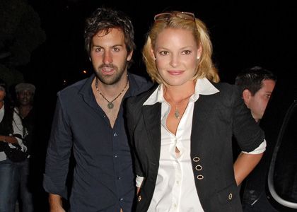 Katherine Heigl and Josh Kelley pose with their adorable doll Adalaide