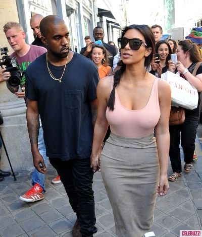 Kim Kardashian Goes Braless for Paris Shopping Spree With Kanye