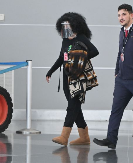 Diana Ross wears two protective masks  at JFK Airport in New York