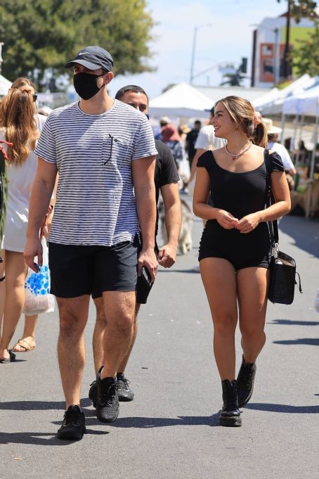 Addison Rae – Seen at the farmers market wearing tiny black shorts in