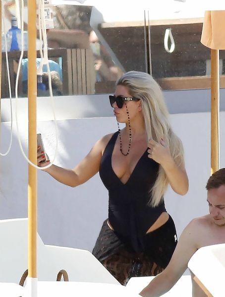 Bianca Gascoigne – Seen in a black swimsuit at Ibiza’s Cala de Bou beach