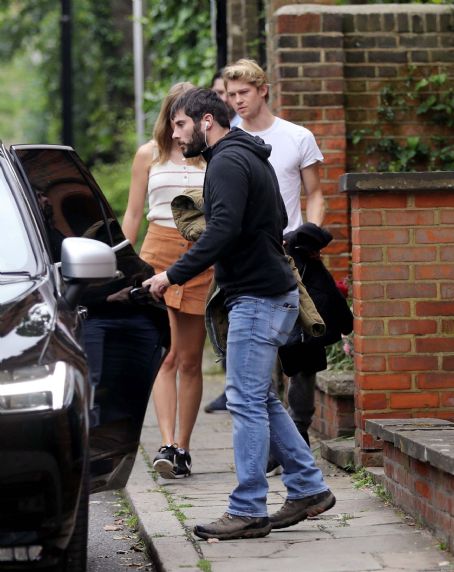 Taylor Swift and Joe Alwyn leaving a restaurant in London