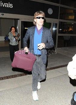 Mick Jagger Arrives into Los Angeles - 3 February 2011