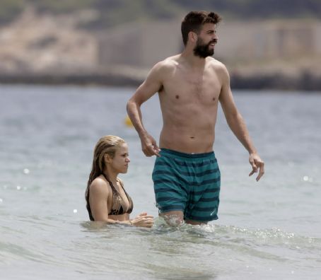 Shakira and her family on a beach in Ibiza, Spain